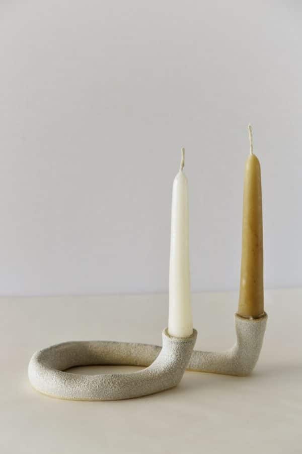 Double Stone Ceramic Taper Candle Holder "Letter G" with white and yellow taper candles inside