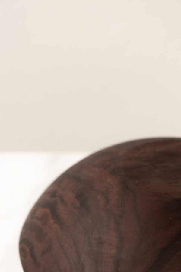 Sustainable Walnut Wooden Salad Bowl detail image of the grain and finish on the bottom of the image