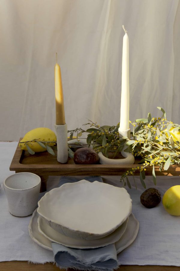 Springtime Tablescape with various Alliyah and Things products (Beewax taper candles, blue linen napkins, Stone with dinnerware set, White ceramic cups, stone double candle holder)