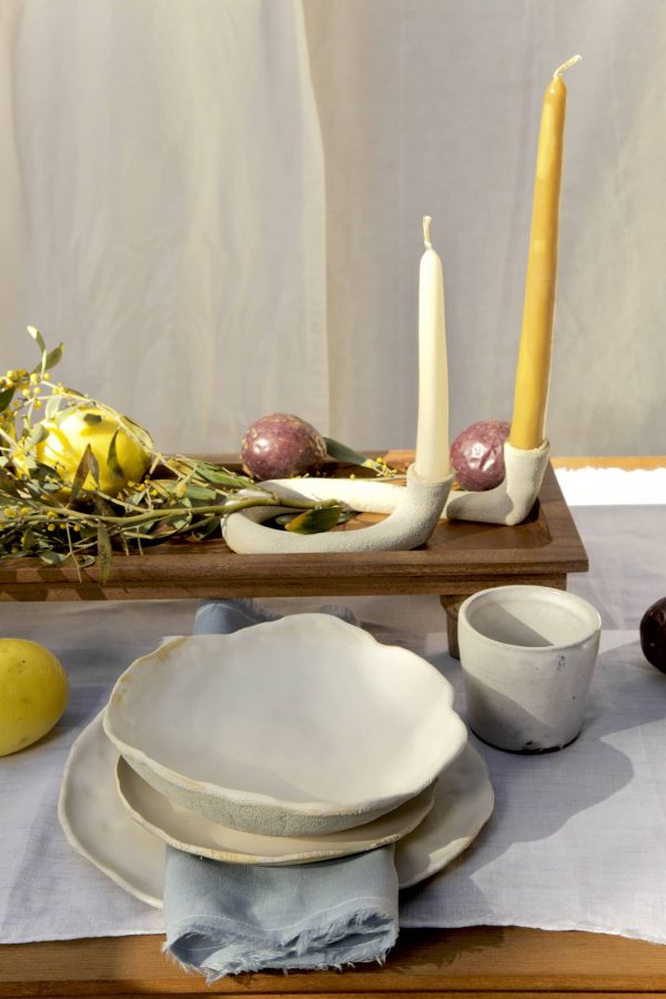 Springtime Tablescape with various Alliyah and Things products (Beewax taper candles, blue linen napkins, Stone with dinnerware set, White ceramic cups, stone double candle holder)