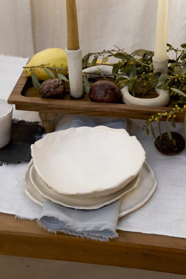 Springtime Tablescape with various Alliyah and Things products (Beewax taper candles, blue linen napkins, linen cocktail napkins, Stone with dinnerware set, White ceramic cups, stone double candle holder)